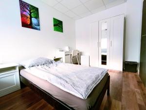 Posteľ alebo postele v izbe v ubytovaní Dimael Hostel & Apartments