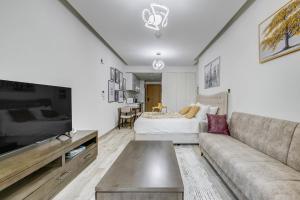 TV a/nebo společenská místnost v ubytování Knokey Ahad Residence