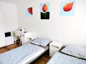 Posteľ alebo postele v izbe v ubytovaní Dimael Hostel & Apartments