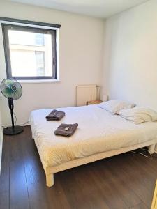 Posteľ alebo postele v izbe v ubytovaní Bel appartement au calme avec parking