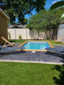 Swimmingpoolen hos eller tæt på Maison avec piscine Pyla sur mer