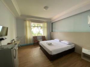 Voodi või voodid majutusasutuse Allisa Resort Hotel toas