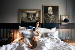 Wellnesshotel Wittelsbach客房内的一张或多张床位
