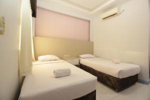 Voodi või voodid majutusasutuse Allisa Resort Hotel toas