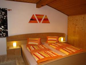 Tempat tidur dalam kamar di Haus Anneliese