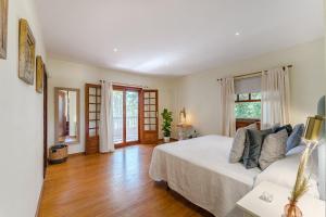 Łóżko lub łóżka w pokoju w obiekcie Villas la Gomera