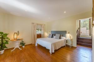 Łóżko lub łóżka w pokoju w obiekcie Villas la Gomera