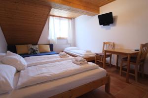 Postel nebo postele na pokoji v ubytování Hotel Kreta
