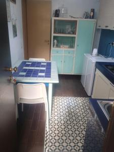 A kitchen or kitchenette at Terrazza Sui Sassi