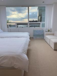 NEW Remodeling Hongdae House房間的床