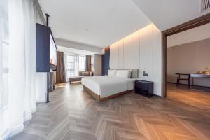 Postel nebo postele na pokoji v ubytování Atour Hotel Chengdu Qingyang Zhongba