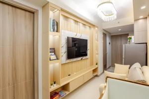 TV a/nebo společenská místnost v ubytování The Manor at S Residences
