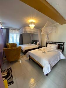 Tina Ma Hotel客房内的一张或多张床位