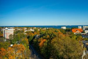 a view of a city with trees and buildings at 19 Apart in Gdynia