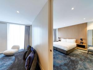 Ліжко або ліжка в номері Pullman Adelaide