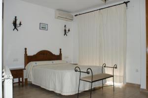 Postel nebo postele na pokoji v ubytování Hotel Juan Francisco