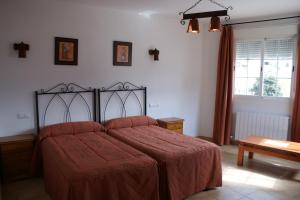 Postel nebo postele na pokoji v ubytování Hotel Juan Francisco