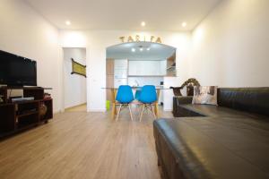 TV a/nebo společenská místnost v ubytování Livingtarifa- Apartamento Tucán