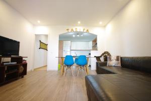 TV a/nebo společenská místnost v ubytování Livingtarifa- Apartamento Tucán
