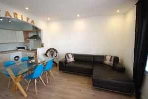 Kuchyň nebo kuchyňský kout v ubytování Livingtarifa- Apartamento Tucán