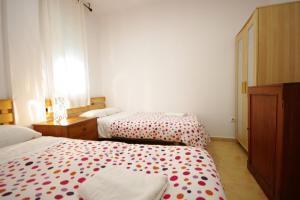 Postel nebo postele na pokoji v ubytování Livingtarifa- Apartamento Tucán