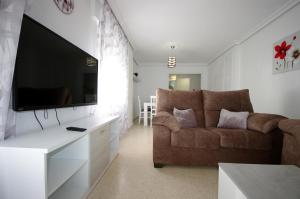 TV a/nebo společenská místnost v ubytování Livingtarifa Casa Del Mar