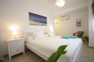 Posteľ alebo postele v izbe v ubytovaní 250 - Casa Birgit + 37 fotografií