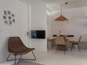 TV a/nebo společenská místnost v ubytování Livingtarifa Apartamento Valhalla