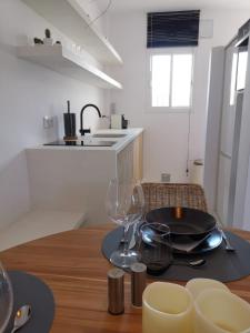 Kuchyň nebo kuchyňský kout v ubytování Livingtarifa Apartamento Valhalla