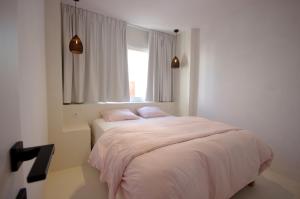 Postel nebo postele na pokoji v ubytování Livingtarifa Apartamento Valhalla