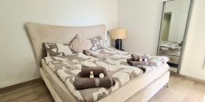 Postel nebo postele na pokoji v ubytování Lejlighed direkte til havet