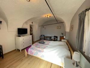 TV a/nebo společenská místnost v ubytování Apartmany u Synagogy