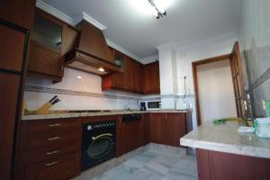 Kuchnia lub aneks kuchenny w obiekcie Atico centro Conil