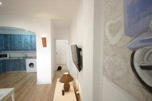 Kuchyň nebo kuchyňský kout v ubytování Livingtarifa Apartamento Agaporni