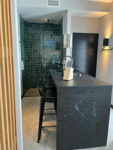 A kitchen or kitchenette at 203 Estudio Suite Tranquilo