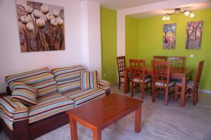 Posedenie v ubytovaní Livingtarifa Apartamento Simba