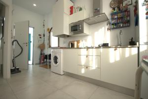 Kuchnia lub aneks kuchenny w obiekcie Livingtarifa Apartamento La Palmera