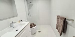 Koupelna v ubytování Lejlighed direkte til havet + 6 fotografií