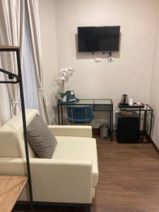 TV a/nebo společenská místnost v ubytování Brignole Diamond Rooms + 44 fotografií