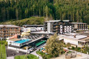 an aerial view of a resort with a swimming pool at Familienresort Buchau in Maurach