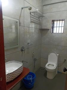 Ένα μπάνιο στο Naik home stay