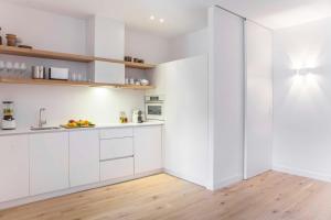 A kitchen or kitchenette at DestinationBCN Universitat Apartments