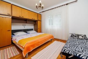 Posteľ alebo postele v izbe v ubytovaní Apartments Zvonimir