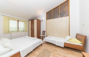 Postel nebo postele na pokoji v ubytování House Rafaeli