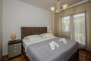 Postel nebo postele na pokoji v ubytování House Rafaeli