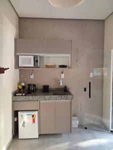 Kuchyň nebo kuchyňský kout v ubytování Casa bosque do Garapiá- Taquaruçu