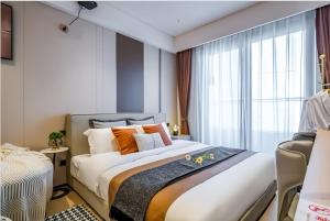 Lova arba lovos apgyvendinimo įstaigoje Raffles Executive Apartment - Guangzhou Huijin International Finance Center, Keyun Road Metro Station Branch-Canton Fair Free Shuttle