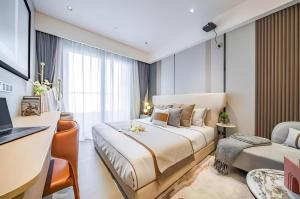 Lova arba lovos apgyvendinimo įstaigoje Raffles Executive Apartment - Guangzhou Huijin International Finance Center, Keyun Road Metro Station Branch-Canton Fair Free Shuttle