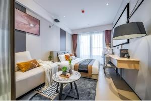 Lova arba lovos apgyvendinimo įstaigoje Raffles Executive Apartment - Guangzhou Huijin International Finance Center, Keyun Road Metro Station Branch-Canton Fair Free Shuttle