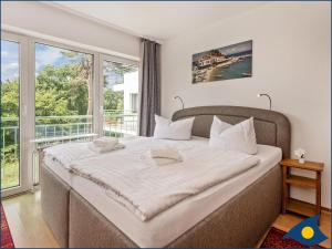 En eller flere senge i et værelse på Ferienwohnung Elias